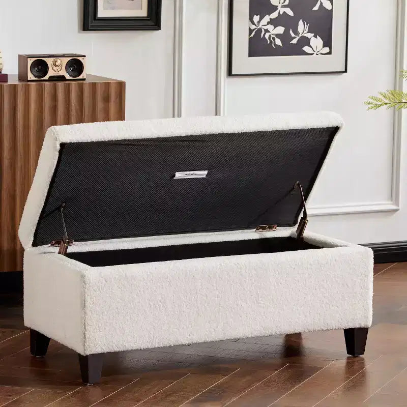 Pouf contenitore imbottito in bouclé con coperchio apribile
