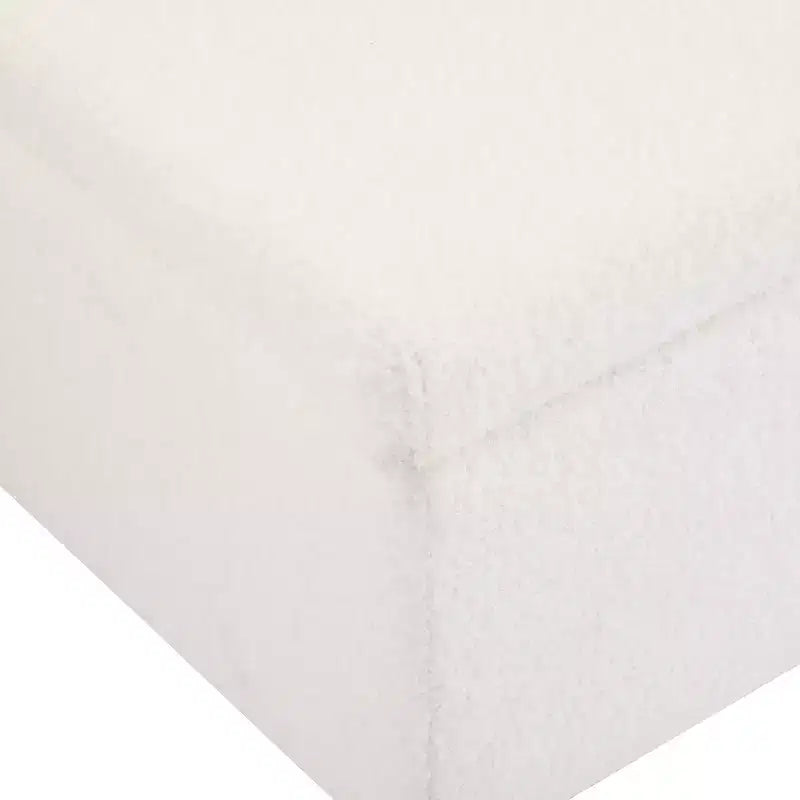 Pouf contenitore imbottito in bouclé con coperchio apribile